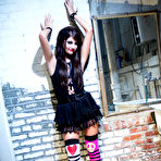 Third pic of Petite gothic teen Cassandra Nix double penetrates her yummy holes with her stiff little fingers.