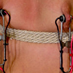 Third pic of Dana DeArmond has slim babes in hot bondage and stimulating their tits and slits with electricity.
