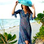 First pic of Blue eyed brunette Nicole K shows her smelting hot body on a desert island beach.