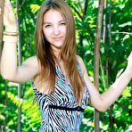 First pic of Pretty teen looking babe Izabel A loses down her swimsuit and bares off slender body outdoor