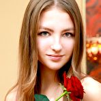 First pic of Little lust filled babe Izabel A takes off her frilly lingerie to show her shaved pussy.