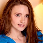 First pic of Delicate teen Eliav presents her plump and shaved pussy while stripping in her big bed.
