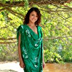 First pic of Angelic Divina A poses on a secluded beach and shows her slim body and shaved pussy.