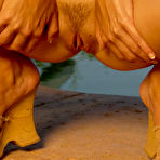 Third pic of Tall tight ass babe Crystal Klein rubs her pussy after removing her bikini