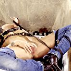 Fourth pic of Ginger Jolie in blue jeans and white panties fills her pink pussy with golden toy