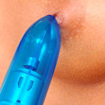 Fourth pic of Blonde girl Jordan Green with clean pussy removes her panties to play with blue dildo
