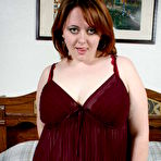 First pic of Pale skinned plumper Betty Boobs strips naked and spreads her shaved pussy open