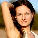 First pic of Beautiful babe Zhanet A has climbed the huge stone to show the nude shaved pussy to the sun