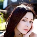 First pic of The beautiful brunette chick Night A and her enticing softcore posing on the beach