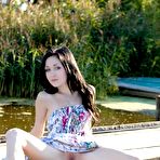 Fourth pic of The beautiful brunette chick Night A and her enticing softcore posing on the beach