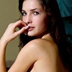 Second pic of Enticing softcore posing of the hot titted brunette with shaved beaver Semmi A