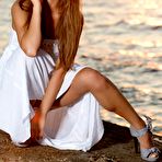 First pic of Elegant young brunette Lily C enjoys the sunset by getting naked and posing for the camera