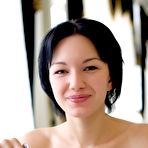 Fourth pic of Hot brunette in beads Loreen A sexily poses showing her cute tits and shaved pussy