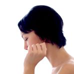 Fourth pic of Naughty brunette babe Loreen A plays in bath and in her bed enticing with her nude pussy