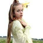 Second pic of The nice looking teenie Milena D is in the open air spreading the pussy on camera