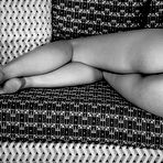 Fourth pic of Amateur babe Vanessa Angel shows her long hair as well as her shaved slit on the couch