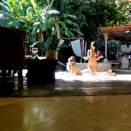 Third pic of Charming diligent brunette Eva Ellington is rubbing her GF&rsquo;s body by the swimming pool
