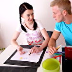 Third pic of Enchanting brunette teen honey with two pigtails in hardcore action with her art teacher. (preview pictures)