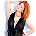 First pic of Violla A Kinky Redhead shows Pussy