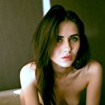 Third pic of Leggy Dark Brunette Naked on Sofa