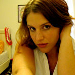 First pic of The busty gf squeezes her big natural breasts