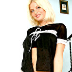 First pic of Trimmed pussy blonde Nastika Nublies removes her garters but leaves her stockings on