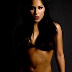 First pic of Latina babe Jenaveve Jolie in massive boots strips out of her lingerie in the semi-dark