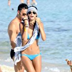 Second pic of Melissa Satta cameltoe in blue bikini on the beach in Spain