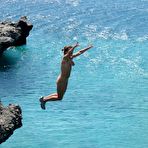 Fourth pic of Brave naked housewife walking around the high rock and..