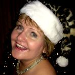 First pic of Busty Mature Mommy Busty Bliss Poses under the Christmas Tree