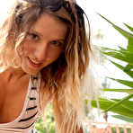 Fourth pic of Cutie Charli Romano flashes her pussy and ass in public and smiles sweetly