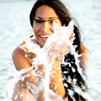 Fourth pic of Small titty brunette chica Ruth Medina takes off her bikini on the beach and swims naked