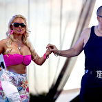 Third pic of Nicole Austin deep cleavage at Motors and Music Experience