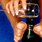 Fourth pic of Angelica Heart fucks herself with a bottle and sucks her toes after removing her stockings