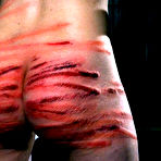 Fourth pic of Heartless Public Whipping - Spanking Video Shots