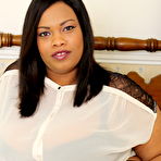 Second pic of Big breasted British black mature bbw is getting naughty