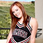 Second pic of Redheaded cheer girl Dani Jensen with pink pussy remove her uniform and panties