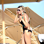 Fourth pic of Rita Rusic shows cleavage on the beach in Miami