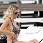 Third pic of Rita Rusic sexy in various bikinies on the beach