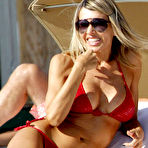 Third pic of Rita Rusic shows boobs and pussy on the beach
