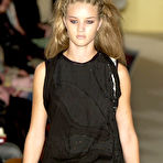 Fourth pic of Rosie Huntington-Whiteley legs & pokies runway shots