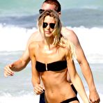 Third pic of Sarah Brandner in black bikini on the beach in Miami