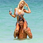 Fourth pic of Busty Shauna Sand sexy in bikini on the beach