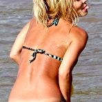 Second pic of Busty Simona Fusco boobslip and cleavage on the beach in Hawaii