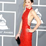 First pic of Skylar Grey side of boob in red dress