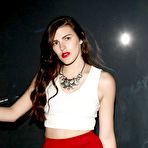 First pic of Busty Brunette in a Red Miniskirt