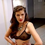 Third pic of Busty Brunette in a Red Miniskirt