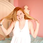 First pic of Lilly Killian takes off her white underwear to show her totally smooth snatch