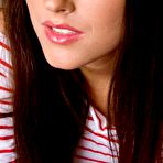 Second pic of Adorable teen cutie chick Deny Moor is getting on the bed is cute clothes and hotly undressing to masturbate