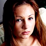 Second pic of Sexy Amy spreading her slim legs and performing a pink wet pussy in close up.